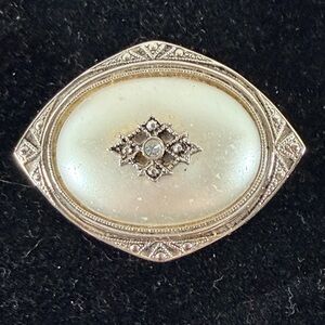 Avon Silver and Cream Brooch with Gem Accent
